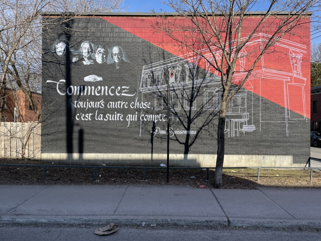murale du quartier d'Info alimentaire avec citation ''commencez toujours autre chose, c'est la suite qui compte''